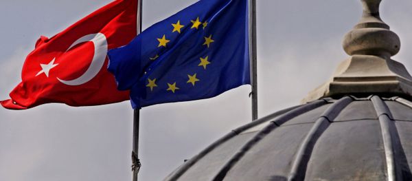 Flags of Turkey, left, and the European Union fly over the dome of a mosque in Istanbul, Turkey Flags of Turkey, left, and the European Union fly over the dome of a mosque in Istanbul, Turkey - Sputnik International