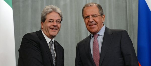Italian Foreign Minister Paolo Gentiloni and his Russian counterpart Sergei Lavrov, right, during a meeting in Moscow Italian Foreign Minister Paolo Gentiloni and his Russian counterpart Sergei Lavrov, right, during a meeting in Moscow - Sputnik International