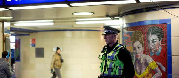 A British police officer stands outside Leytonstone underground train station in east London, Monday, Dec. 7, 2015. A British police officer stands outside Leytonstone underground train station in east London, Monday, Dec. 7, 2015. - Sputnik International