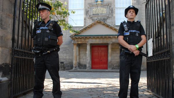 Police are seen outside Canongate Kirk in Edinburgh, Scotland - Sputnik International