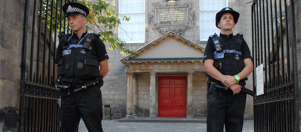 Police are seen outside Canongate Kirk in Edinburgh, Scotland - Sputnik International