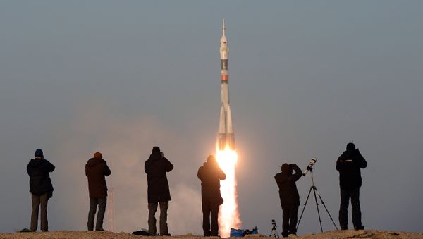 The launch of a Soyuz-FG rocket with the Soyuz TMA-19M manned spacecraft from the Baikonur Space Center - Sputnik International
