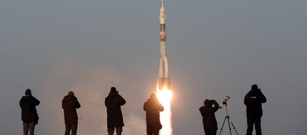 The launch of a Soyuz-FG rocket with the Soyuz TMA-19M manned spacecraft from the Baikonur Space Center - Sputnik International