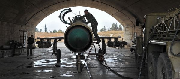 MiG-21 aircraft of the Syrian Air Force gets ready for a mission at the Hama airbase near the city of Hama, Syria's Hama Province MiG-21 aircraft of the Syrian Air Force gets ready for a mission at the Hama airbase near the city of Hama, Syria's Hama Province - Sputnik International