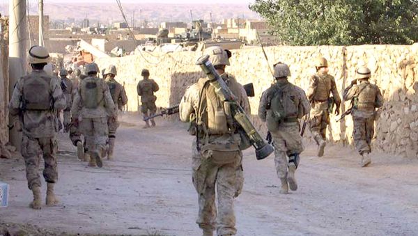 A picture released by the US Marines shows Marines from 3rd Battalion, 2nd Marine Regiment (3/2) and Iraqi Special Forces patrolling a street in the city of Karabilah, near Iraq's northwestern border with Syria (file) A picture released by the US Marines shows Marines from 3rd Battalion, 2nd Marine Regiment (3/2) and Iraqi Special Forces patrolling a street in the city of Karabilah, near Iraq's northwestern border with Syria (file) - Sputnik International