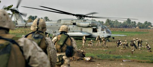 US Marines are picked up by a helicopter after conducting a cordon and knock in al-Qaim, near the Syria border, western Iraq (File) US Marines are picked up by a helicopter after conducting a cordon and knock in al-Qaim, near the Syria border, western Iraq (File) - Sputnik International