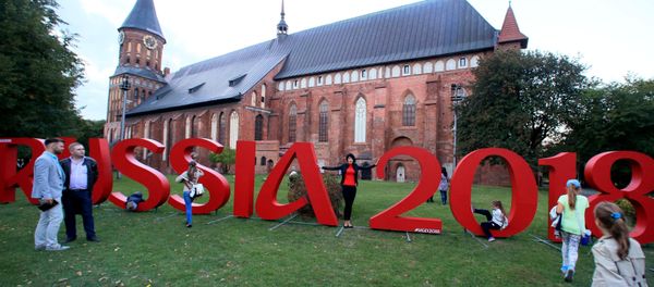 The official hashtag of the 2018 FIFA World Cup, which Russian will host, stands in front of the Konigsberg Cathedral, Kaliningrad - Sputnik International