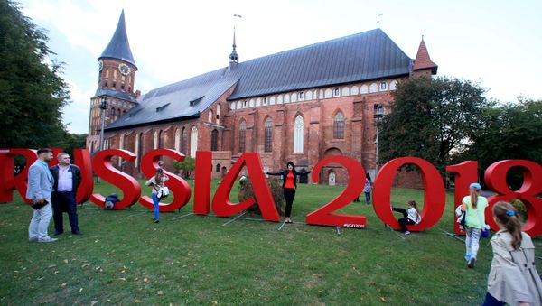 The official hashtag of the 2018 FIFA World Cup, which Russian will host, stands in front of the Konigsberg Cathedral, Kaliningrad The official hashtag of the 2018 FIFA World Cup, which Russian will host, stands in front of the Konigsberg Cathedral, Kaliningrad - Sputnik International
