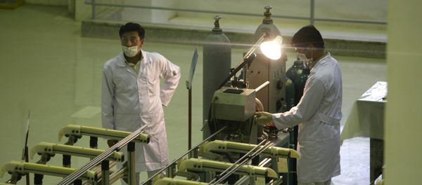In this April 9, 2009 file picture Iranian technicians work at a new facility producing uranium fuel for a planned heavy-water nuclear reactor, just outside the city of Isfahan, 255 miles (410 kilometers) south of the capital Tehran In this April 9, 2009 file picture Iranian technicians work at a new facility producing uranium fuel for a planned heavy-water nuclear reactor, just outside the city of Isfahan, 255 miles (410 kilometers) south of the capital Tehran - Sputnik International