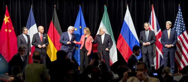 (L-R) China's Foreign Minister Wang Yi, French Foreign Minister Laurent Fabius, German Minister for Foreign Affairs Frank-Walter Steinmeier, High Representative of the European Union for Foreign Affairs and Security Policy Federica Mogherini, Iranian Foreign Minister Mohammad Javad Zarif, British Foreign Secretary Philip Hammond and US Secretary of State John Kerry pose for a picture during the final press conference of Iran nuclear talks in Vienna, Austria on July 14, 2015 (L-R) China's Foreign Minister Wang Yi, French Foreign Minister Laurent Fabius, German Minister for Foreign Affairs Frank-Walter Steinmeier, High Representative of the European Union for Foreign Affairs and Security Policy Federica Mogherini, Iranian Foreign Minister Mohammad Javad Zarif, British Foreign Secretary Philip Hammond and US Secretary of State John Kerry pose for a picture during the final press conference of Iran nuclear talks in Vienna, Austria on July 14, 2015 - Sputnik International