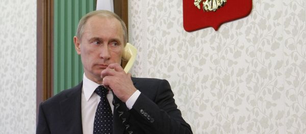 Russian President Vladimir Putin talks on the phone. File photo Russian President Vladimir Putin talks on the phone. File photo - Sputnik International