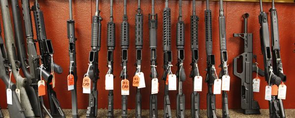 This photo taken on Thursday, June 27, 2013, shows a rack of rifles at Firing-Line gun store in Aurora, Colo. - Sputnik International