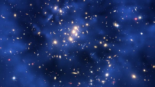 This NASA handout image received 15 May 2007 shows dark matter ring in a galaxy center - Sputnik International