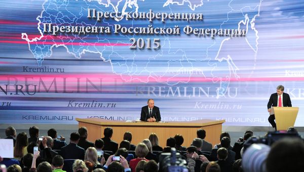 December 17, 2015. Russian President Vladimir Putin, center, at the 11th annual news conference at the World Trade Center on Krasnaya Presnya December 17, 2015. Russian President Vladimir Putin, center, at the 11th annual news conference at the World Trade Center on Krasnaya Presnya - Sputnik International