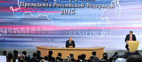 December 17, 2015. Russian President Vladimir Putin, center, at the 11th annual news conference at the World Trade Center on Krasnaya Presnya December 17, 2015. Russian President Vladimir Putin, center, at the 11th annual news conference at the World Trade Center on Krasnaya Presnya - Sputnik International