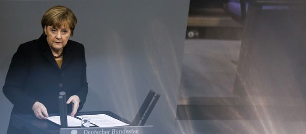 German Chancellor Angela Merkel delivers her speech about the European Summit at the German parliament Bundestag in Berlin, Wednesday, Dec. 16, 2015. - Sputnik International
