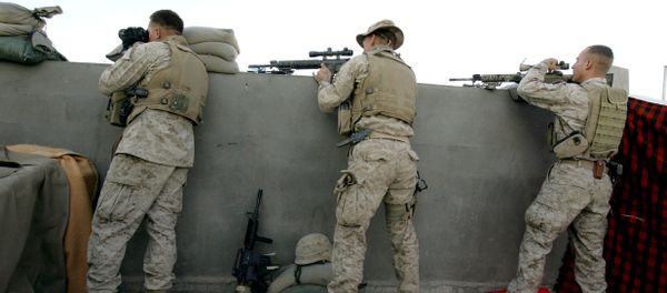 US marine sharpshooters with 3/6 Marines Recon Unit fire at insurgents and foreign fighters from a rooftopof a house the town of al-Qaim at the Iraqi-Syrian border (File) US marine sharpshooters with 3/6 Marines Recon Unit fire at insurgents and foreign fighters from a rooftopof a house the town of al-Qaim at the Iraqi-Syrian border (File) - Sputnik International