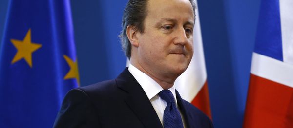 Britain's Prime Minister David Cameron arrives for a joint news conference with his Polish counterpart Beata Szydlo in Warsaw, Poland December 10, 2015 - Sputnik International