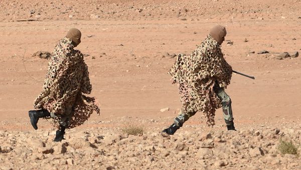 Snipers of Saudi Special forces run before taking a position during anti-terrorist exercises (File) Snipers of Saudi Special forces run before taking a position during anti-terrorist exercises (File) - Sputnik International