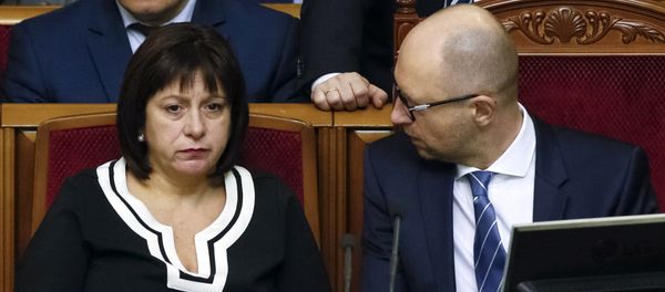 Ukraine's Prime Minister Arseny Yatseniuk (R) and Finance Minister Natalia Yaresko attend a session of parliament in Kiev, Ukraine, December 17, 2015 Ukraine's Prime Minister Arseny Yatseniuk (R) and Finance Minister Natalia Yaresko attend a session of parliament in Kiev, Ukraine, December 17, 2015 - Sputnik International