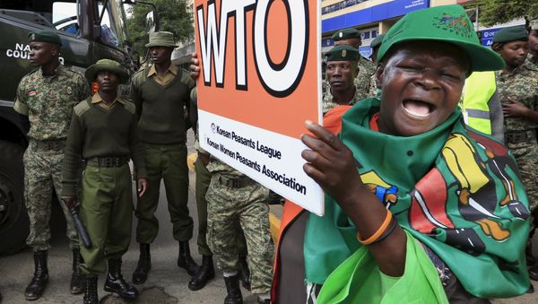 A women protests against the World Trade Organization (WTO) in Kenya's capital Nairobi December 17, 2015 - Sputnik International