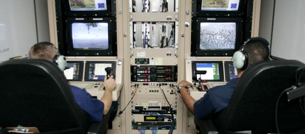 CBP Air and Marine officers control and watch images taken by Unmanned aerial vehicles (drones) of the CBP. This surveillance provides information concerning illegal activities taking place in remote areas to Border Patrol agents. - Sputnik International
