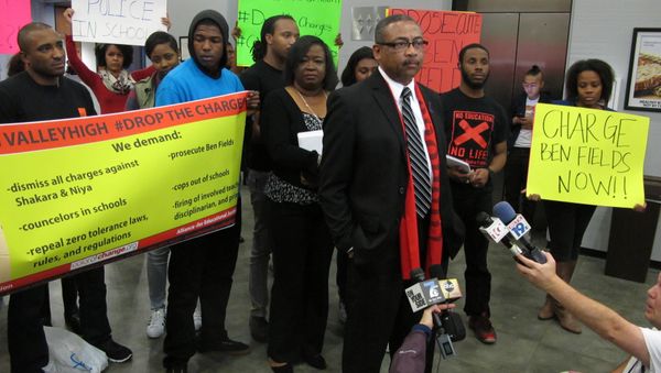 Pastor Thomas Dixon speaks at a rally at the Richland County courthouse on Thursday, December 17, 2015, in Columbia, SC, asking prosecutors to drop charges against a 16-year-old South Carolina high school student who was videotaped being yanked from her desk and thrown to the floor by a police officer in her classroom at Spring Valley High. - Sputnik International