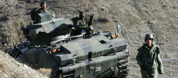 Turkish soldiers patrol on a road near the Turkey-Iraq border in the mainly Kurdish southeastern province of Sirnak (File) Turkish soldiers patrol on a road near the Turkey-Iraq border in the mainly Kurdish southeastern province of Sirnak (File) - Sputnik International
