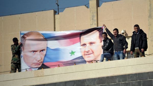 Al-Baath University students hold a rally in Homs in support of Russia's military operation in Syria Al-Baath University students hold a rally in Homs in support of Russia's military operation in Syria - Sputnik International