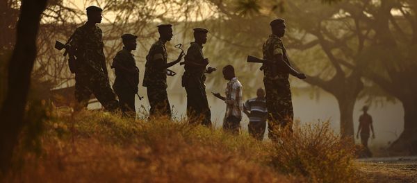 Soldiers guard a polling station in the Musaga neighborhood of Bujumbura on the day of Presidential elections in Burundi on July 21, 2015 Soldiers guard a polling station in the Musaga neighborhood of Bujumbura on the day of Presidential elections in Burundi on July 21, 2015 - Sputnik International