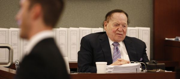 Las Vegas Sands Corp. Chairman and CEO Sheldon Adelson, right, testifies in court Monday, May 4, 2015, in Las Vegas. Steven Jacobs, former Sands Macau resort chief, is suing Sands China and Las Vegas Sands Corp. over a wrongful termination case. Las Vegas Sands Corp. Chairman and CEO Sheldon Adelson, right, testifies in court Monday, May 4, 2015, in Las Vegas. Steven Jacobs, former Sands Macau resort chief, is suing Sands China and Las Vegas Sands Corp. over a wrongful termination case. - Sputnik International