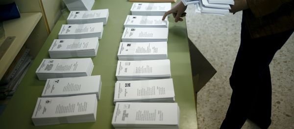 An election worker prepares ballots ahead of Spain's general election at a school in Los Prados, a small hamlet near the city of Ronda, southern Spain An election worker prepares ballots ahead of Spain's general election at a school in Los Prados, a small hamlet near the city of Ronda, southern Spain - Sputnik International