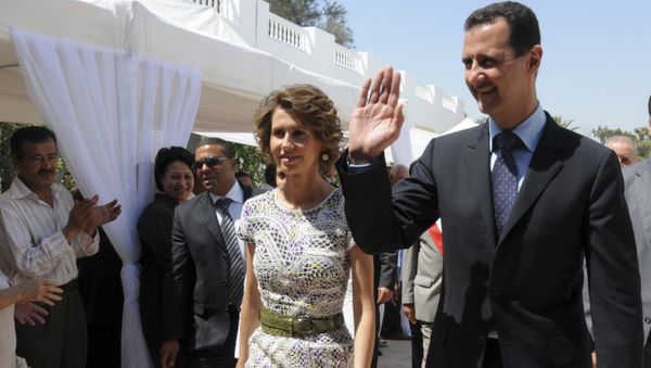 Syrian President Bashar Assad and his wife Asma Assad. (File) - Sputnik International