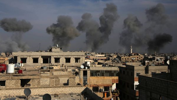Smoke billows after air strikes by regime forces on the town of Douma in the eastern Ghouta region, a rebel stronghold east of the capital Damascus, on December 13, 2015 Smoke billows after air strikes by regime forces on the town of Douma in the eastern Ghouta region, a rebel stronghold east of the capital Damascus, on December 13, 2015 - Sputnik International