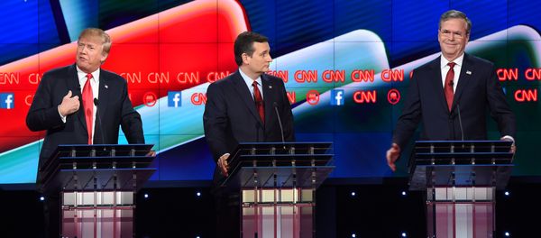 Republican presidential hopefuls Donald Trump (L), Ted Cruz (C) and Jeb Bush (R) on stage at the Republican Presidential Debate, hosted by CNN, at The Venetian Las Vegas on December 15, 2015 in Las Vegas, Nevada. Republican presidential hopefuls Donald Trump (L), Ted Cruz (C) and Jeb Bush (R) on stage at the Republican Presidential Debate, hosted by CNN, at The Venetian Las Vegas on December 15, 2015 in Las Vegas, Nevada. - Sputnik International