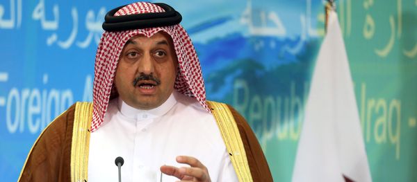 Qatari Foreign Minister Khalid bin Mohammed al-Attiyah speaks during a press conference with his Iraqi counterpart Ibrahim al-Jaafari in Baghdad, Iraq, Friday, May 29, 2015. - Sputnik International