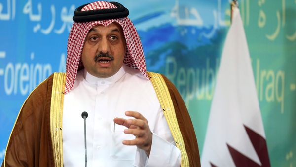 Qatari Foreign Minister Khalid bin Mohammed al-Attiyah speaks during a press conference with his Iraqi counterpart Ibrahim al-Jaafari in Baghdad, Iraq, Friday, May 29, 2015. - Sputnik International