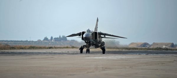 A MiG-23 aircraft of the Syrian Air Force on a runaway at the Hama airbase near the city of Hama, Syria's Hama Province A MiG-23 aircraft of the Syrian Air Force on a runaway at the Hama airbase near the city of Hama, Syria's Hama Province - Sputnik International