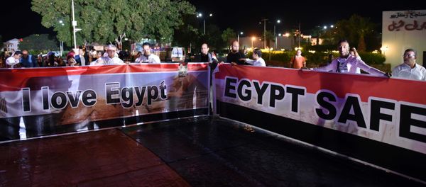 People take part in a march in Naama Bay, a popular area of Sharm el-Sheikh, as part of an initiative to encourage tourism, on November 12, 2015. People take part in a march in Naama Bay, a popular area of Sharm el-Sheikh, as part of an initiative to encourage tourism, on November 12, 2015. - Sputnik International