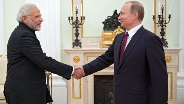 Russian President Vladimir Putin, right, meets with Indian Prime Minister Narendra Modi at the Moscow Kremlin Russian President Vladimir Putin, right, meets with Indian Prime Minister Narendra Modi at the Moscow Kremlin - Sputnik International