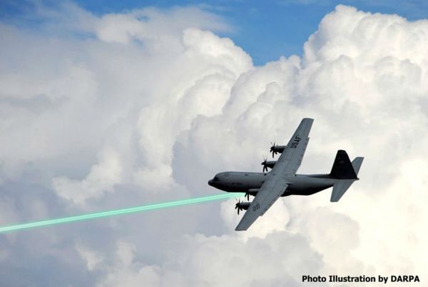 Photo illustration of an AC-130 gunship firing a laser weapon - Sputnik International