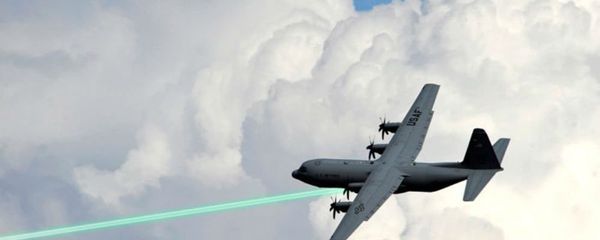 Photo illustration of an AC-130 gunship firing a laser weapon Photo illustration of an AC-130 gunship firing a laser weapon - Sputnik International