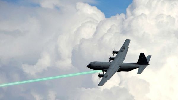 Photo illustration of an AC-130 gunship firing a laser weapon - Sputnik International
