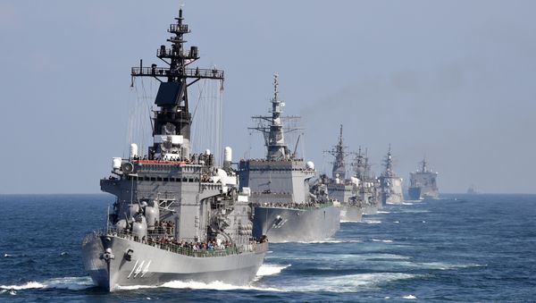 This file picture taken on October 18, 2015 shows Japan's Maritime Self-Defense Force (MSDF) escort ship Kurama (L) sailing with other ships during a fleet review off Sagami Bay, Kanagawa prefecture - Sputnik International