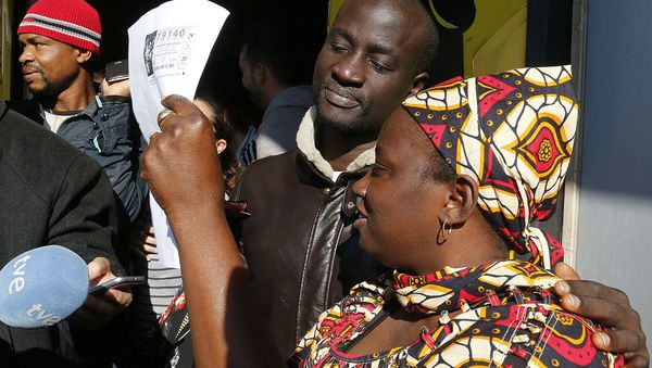 Refugee wins lottery in Spain Refugee wins lottery in Spain - Sputnik International