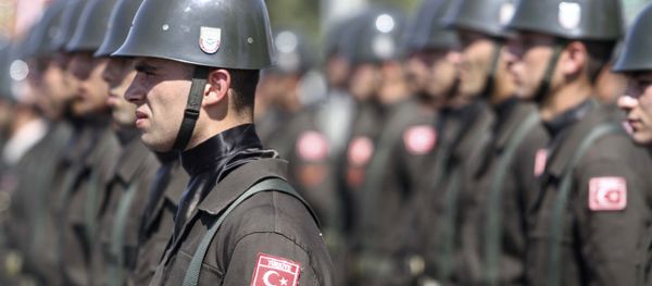 Turkish soldiers attend an army parade marking the 38th anniversary of the Turkish military invasion of Cyprus, on July 20, 2012 in Nicosia, in the northern Turkish-controlled area of the of the east Mediterranean island Turkish soldiers attend an army parade marking the 38th anniversary of the Turkish military invasion of Cyprus, on July 20, 2012 in Nicosia, in the northern Turkish-controlled area of the of the east Mediterranean island - Sputnik International