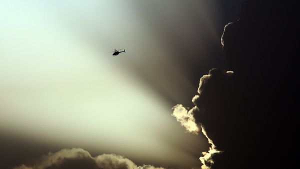 A U.S. helicopter flies during clashes between Taliban fighters and Afghan government forces in Kabul, Afghanistan, Thursday, July 17, 2014 A U.S. helicopter flies during clashes between Taliban fighters and Afghan government forces in Kabul, Afghanistan, Thursday, July 17, 2014 - Sputnik International