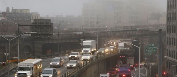Traffic passes along a foggy Brooklyn Queens Expressway, Wednesday, Dec. 23, 2015 in New York. A weather pattern partly linked with El Nino has turned winter upside-down across the U.S. during a week of heavy holiday travel, bringing spring-like warmth to the Northeast, a risk of tornadoes in the South and so much snow across the West that even skiing slopes have been overwhelmed Traffic passes along a foggy Brooklyn Queens Expressway, Wednesday, Dec. 23, 2015 in New York. A weather pattern partly linked with El Nino has turned winter upside-down across the U.S. during a week of heavy holiday travel, bringing spring-like warmth to the Northeast, a risk of tornadoes in the South and so much snow across the West that even skiing slopes have been overwhelmed - Sputnik International