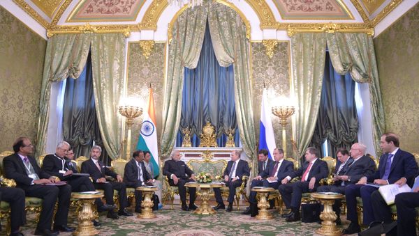 Russian President Vladimir Putin meets with Indian Prime Minister Narendra Modi Russian President Vladimir Putin meets with Indian Prime Minister Narendra Modi - Sputnik International