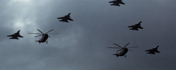 In this Aug. 23, 2015 file photo, Chinese Mi-8 military helicopters and J-16 fighter jets fly over central Beijing during a rehearsal for a large military parade. In this Aug. 23, 2015 file photo, Chinese Mi-8 military helicopters and J-16 fighter jets fly over central Beijing during a rehearsal for a large military parade. - Sputnik International